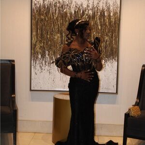 Elegant Black Evening Gown with Gold Accents